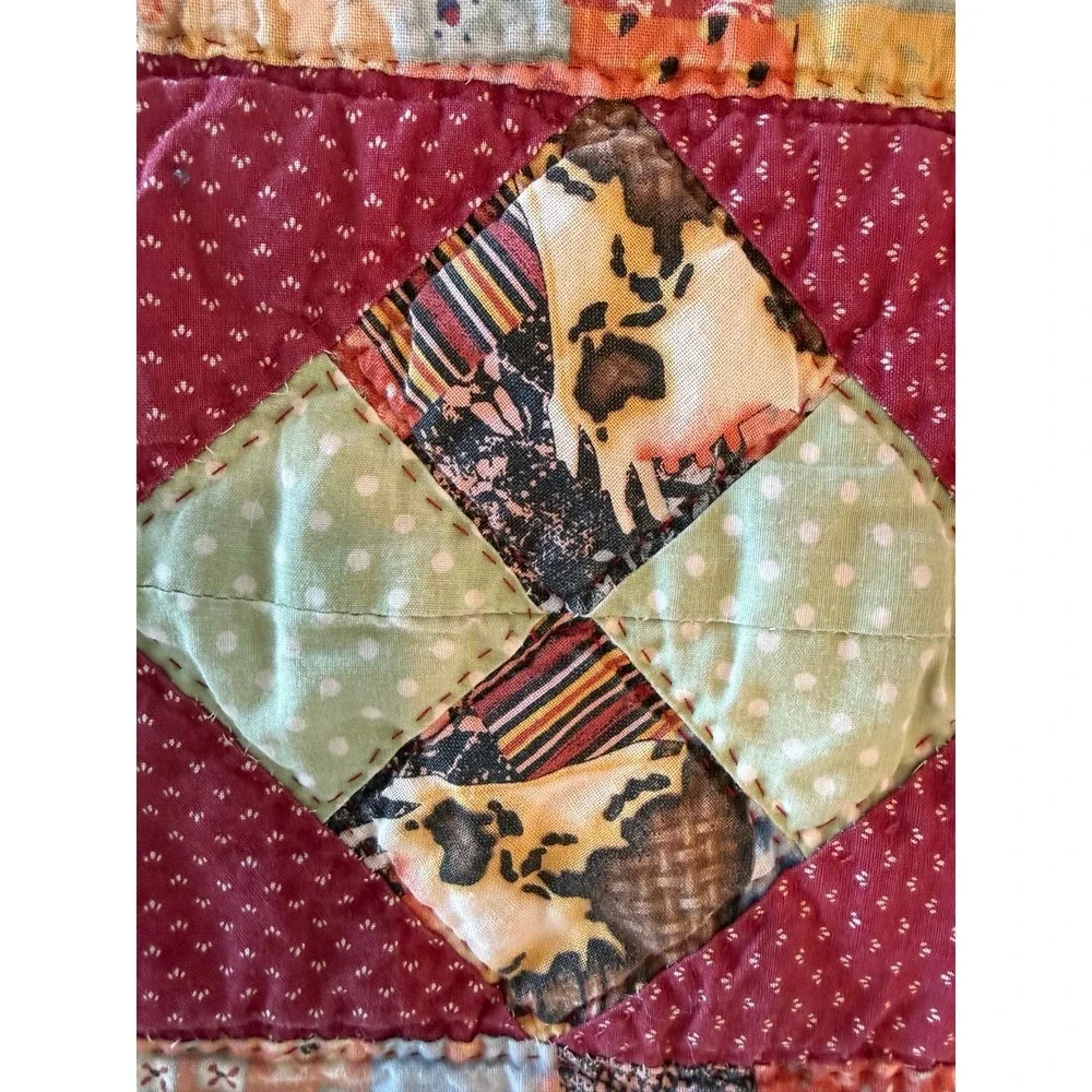Small hand sewn quilt. Cutter